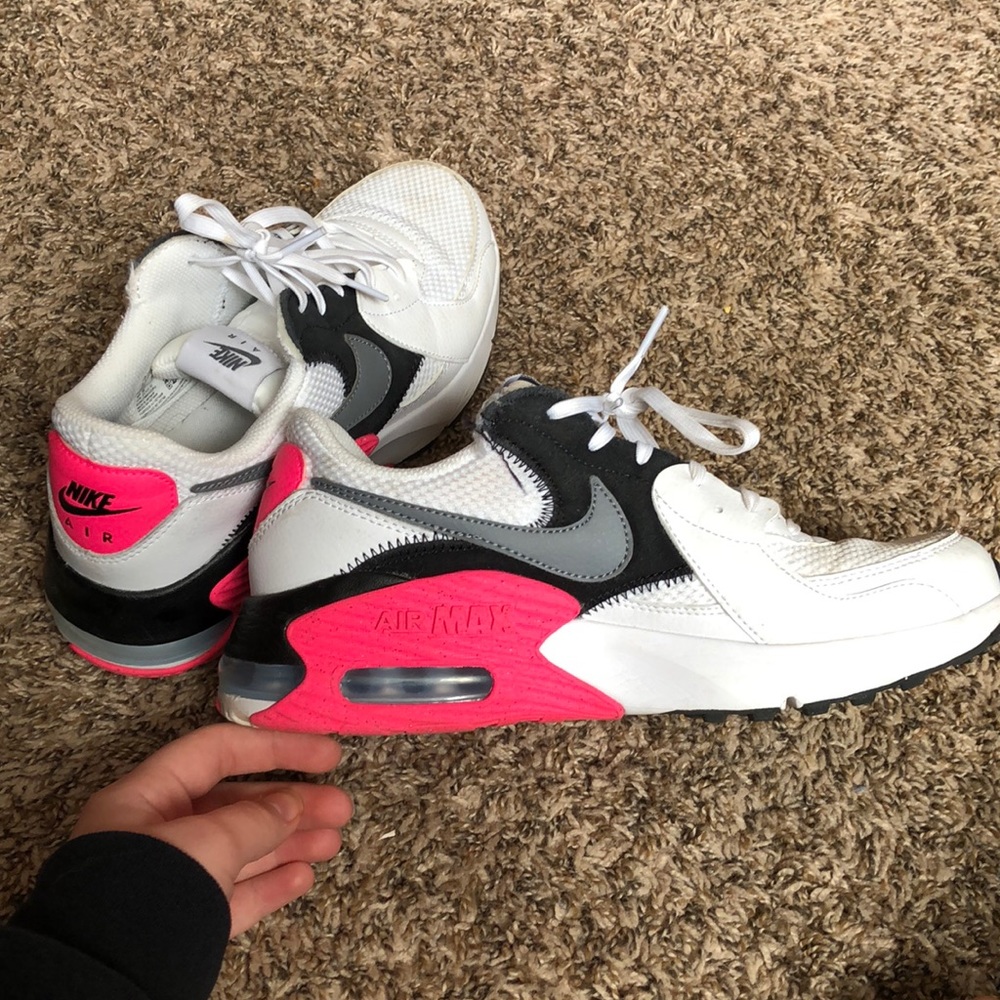 Pink, black, grey, and white nike air max